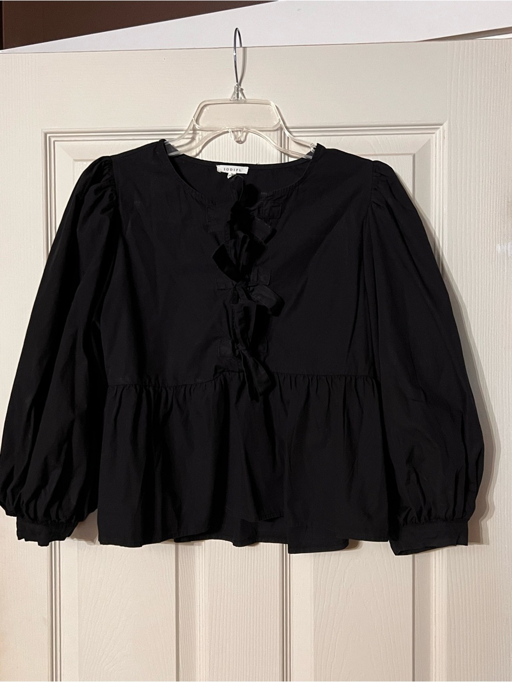 JODIFL Black Puff-Sleeve Tie-Front Peplum Blouse